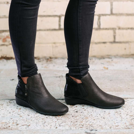Lifestyle image for Damascus Wedged Boot - Onyx/Black Lizard