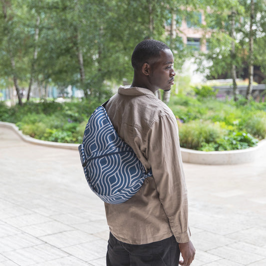Lifestyle image for Reversible Print Backpack Medium - Blue Wave